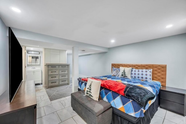 bedroom with recessed lighting and marble finish floor