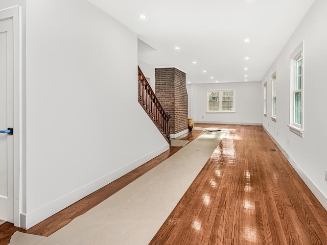 hallway featuring hardwood / wood-style floors