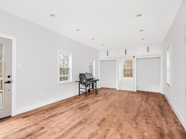 interior space with light hardwood / wood-style flooring