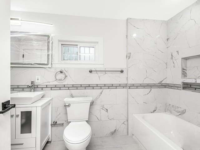 bathroom featuring toilet, tile walls, and vanity