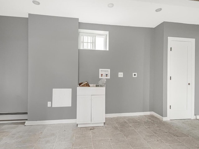 washroom featuring a baseboard heating unit, hookup for a washing machine, cabinets, and hookup for an electric dryer