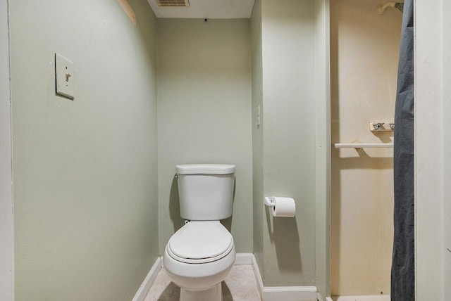 bathroom featuring toilet