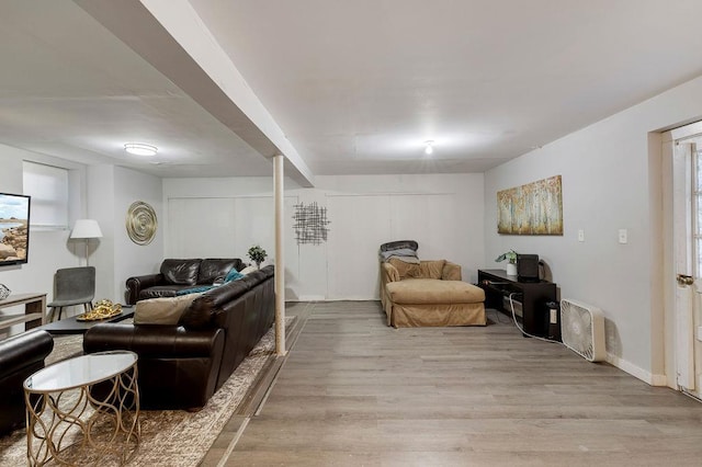 living room with light hardwood / wood-style floors