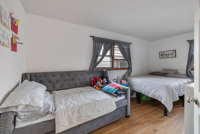 bedroom featuring light hardwood / wood-style floors