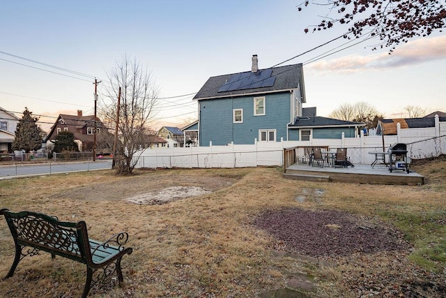 yard at dusk with a patio area