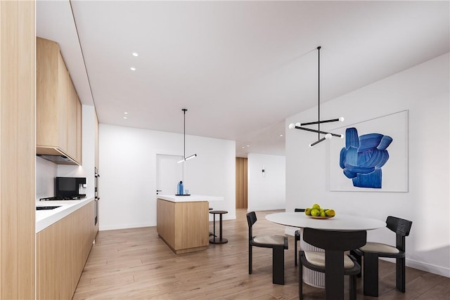 dining area with light wood-type flooring