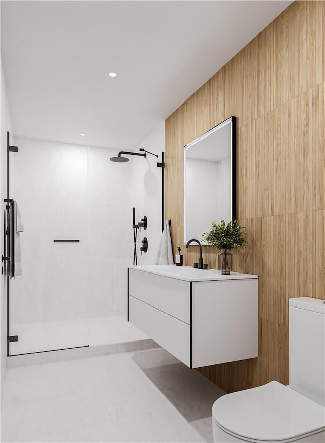 bathroom featuring a shower, wood walls, vanity, and toilet