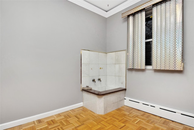 bathroom with a baseboard heating unit, parquet floors, and ornamental molding