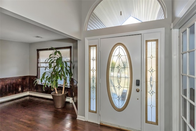 entrance foyer featuring baseboard heating