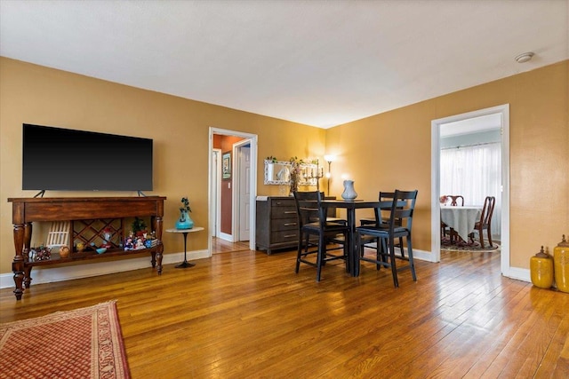 dining room with hardwood / wood-style floors