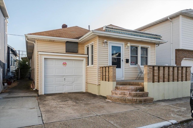 view of front of home with a garage