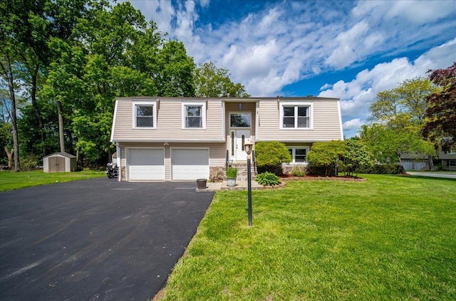 400 Philo St, New Windsor, NY 12553 - bi-level home with a storage unit, asphalt driveway, a garage, and a front lawn