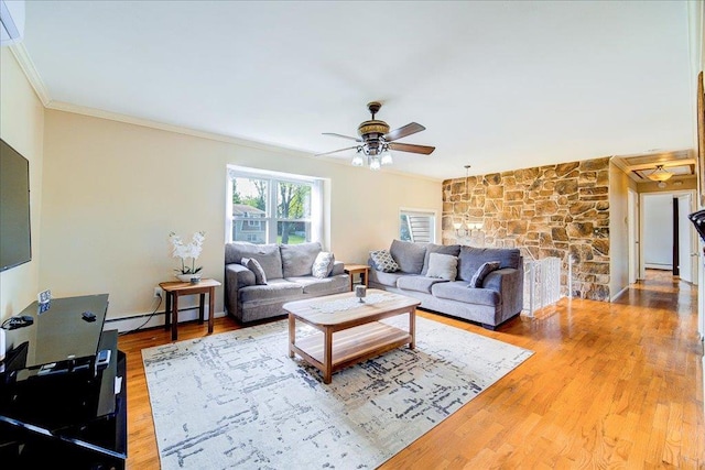 400 Philo St, New Windsor, NY 12553 - living room featuring ornamental molding, a baseboard radiator, ceiling fan, and wood finished floors