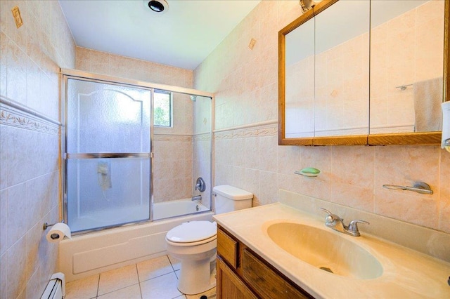 400 Philo St, New Windsor, NY 12553 - bathroom featuring tile walls, toilet, tile patterned floors, enclosed tub / shower combo, and vanity