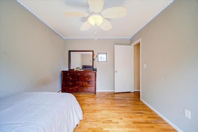 400 Philo St, New Windsor, NY 12553 - bedroom with crown molding, light wood-style flooring, baseboards, and ceiling fan