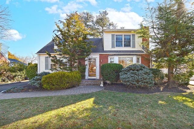 view of front of home with a front yard