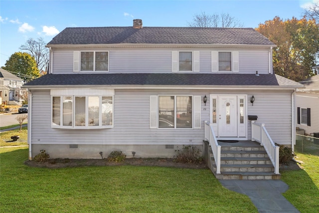 view of front of house featuring a front lawn