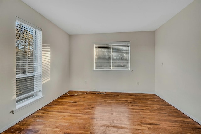 empty room with light wood-type flooring