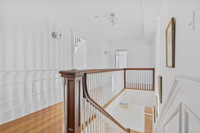 stairs featuring wood-type flooring