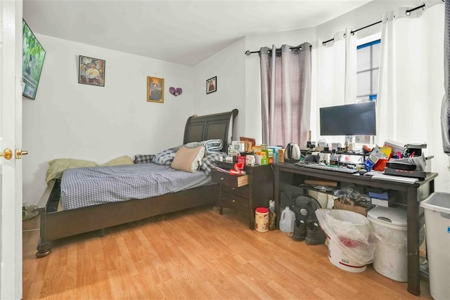 bedroom featuring light wood-type flooring