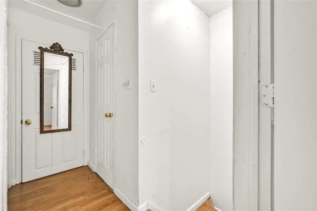 hallway featuring light hardwood / wood-style floors