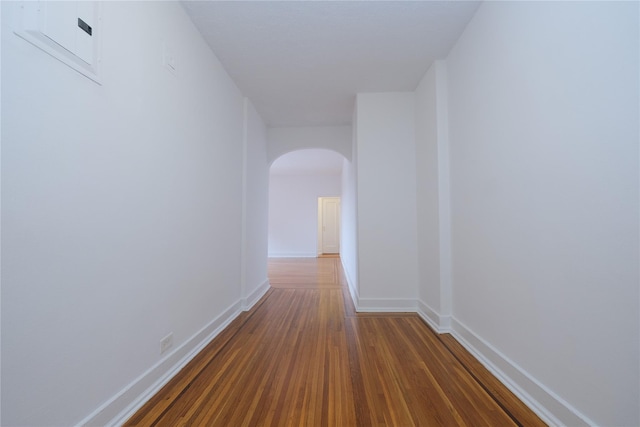 corridor featuring dark hardwood / wood-style floors