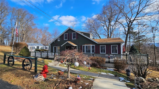 bungalow-style home featuring a wooden deck