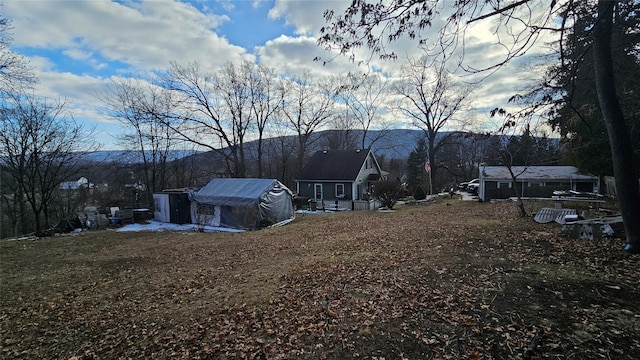 exterior space featuring a mountain view