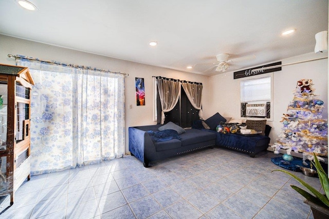 tiled living room featuring ceiling fan and cooling unit