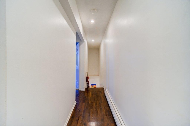 hall with dark hardwood / wood-style flooring