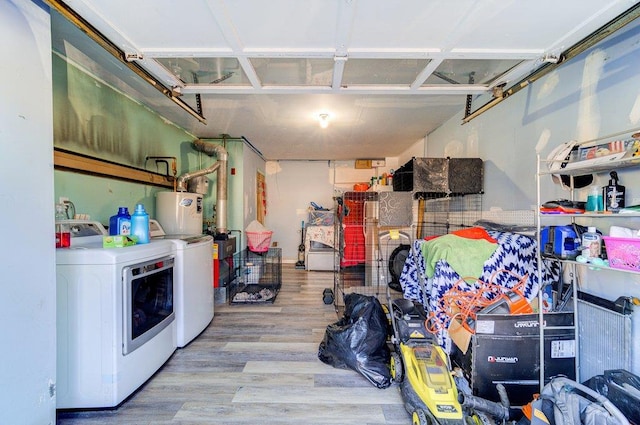 garage featuring separate washer and dryer and gas water heater