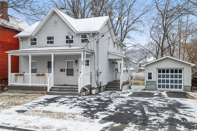 view of front facade with a garage and an outdoor structure