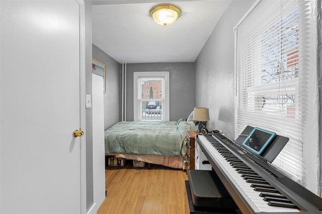 bedroom with light wood-type flooring