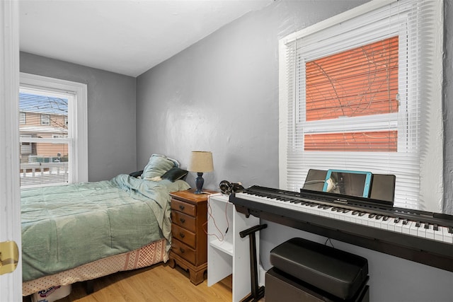 bedroom with light wood-type flooring