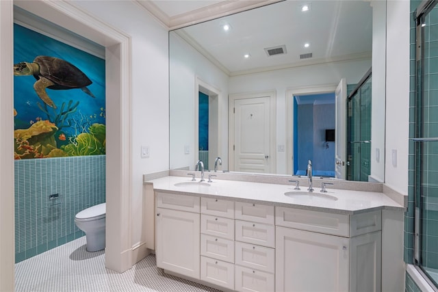 bathroom featuring toilet, tile patterned floors, an enclosed shower, vanity, and crown molding