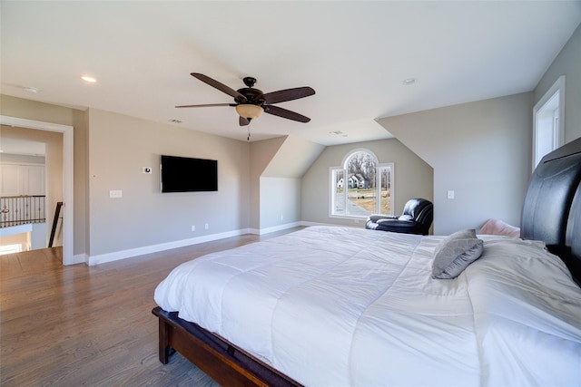 bedroom with ceiling fan and dark hardwood / wood-style flooring