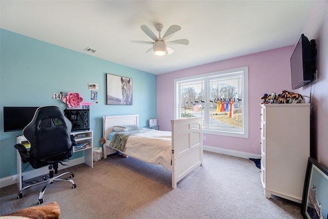 bedroom with ceiling fan and light colored carpet