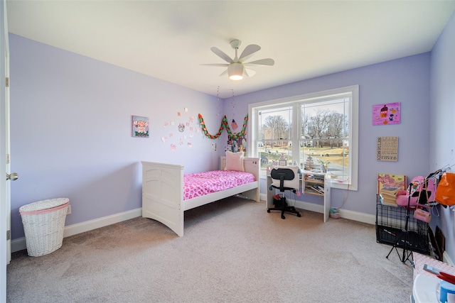 bedroom with ceiling fan and carpet