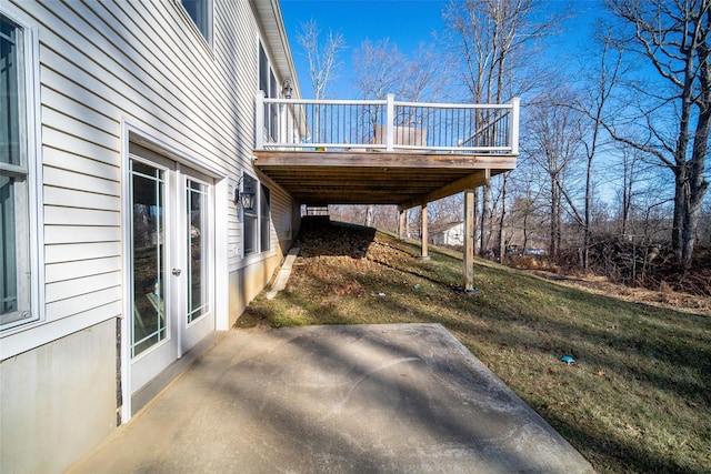 view of home's exterior featuring a lawn and a patio