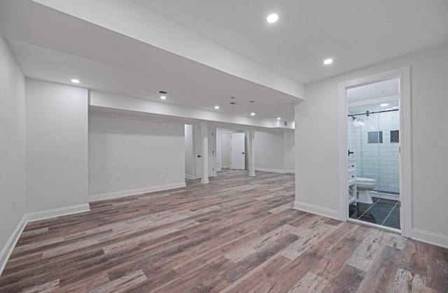 basement with wood-type flooring