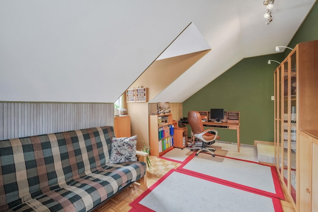 home office featuring vaulted ceiling and light parquet flooring