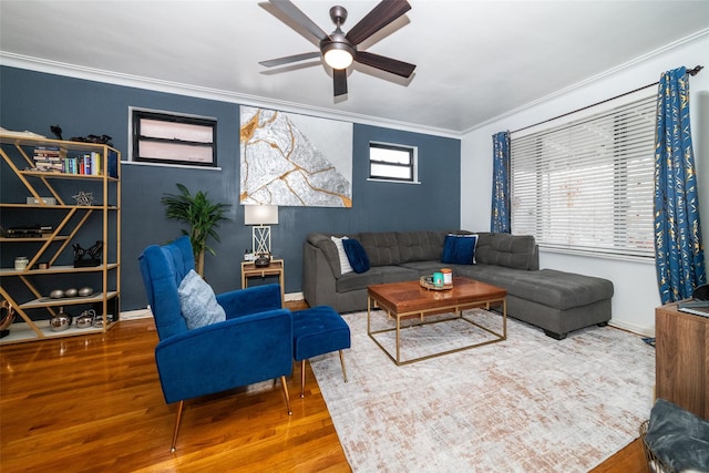 living room with ceiling fan, crown molding, and hardwood / wood-style flooring