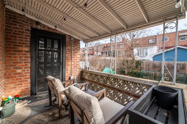 view of patio / terrace with a balcony