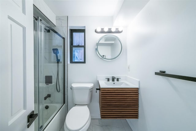 full bathroom with toilet, enclosed tub / shower combo, and vanity