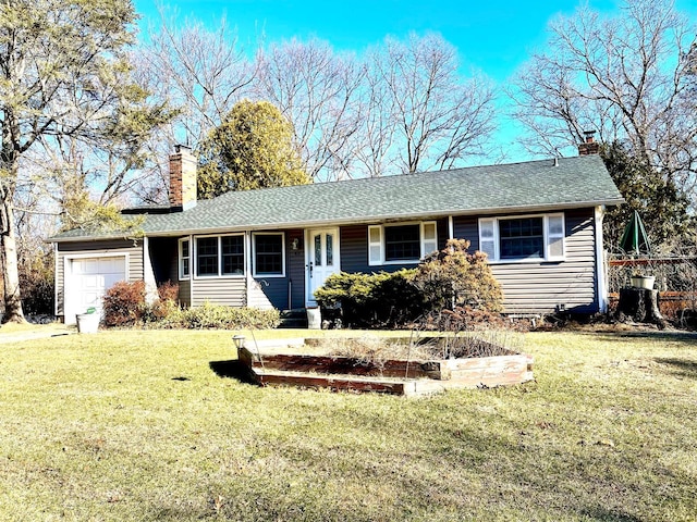 ranch-style home with a front lawn and a garage