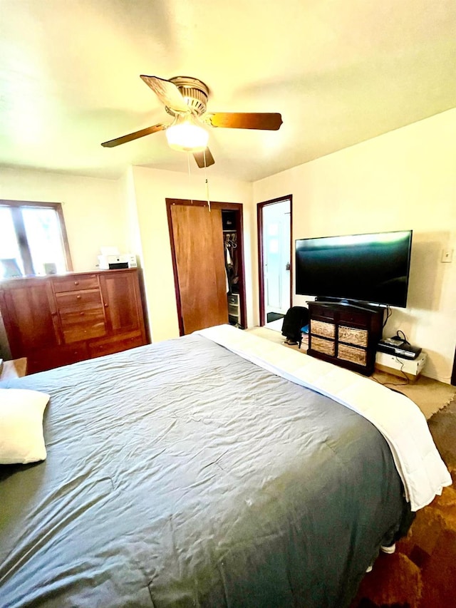 bedroom featuring ceiling fan