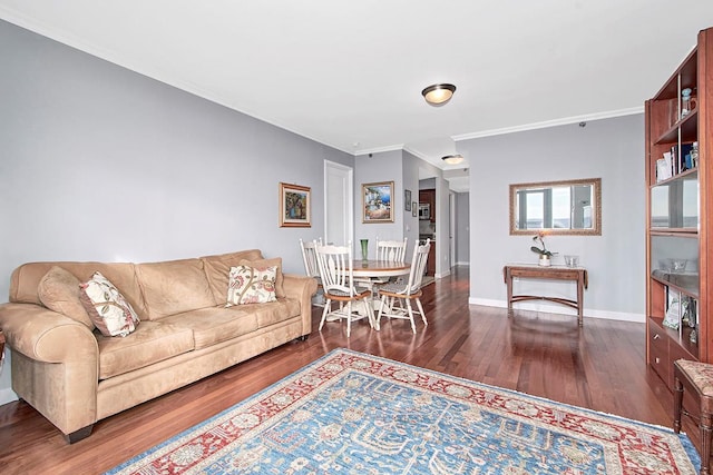 living room featuring ornamental molding and dark hardwood / wood-style floors