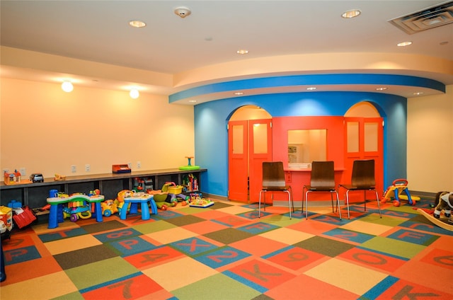 rec room with visible vents and recessed lighting