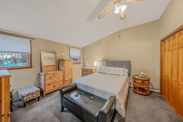 bedroom featuring lofted ceiling, ceiling fan, carpet flooring, and a closet