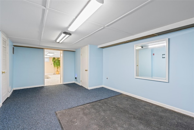 basement featuring carpet flooring